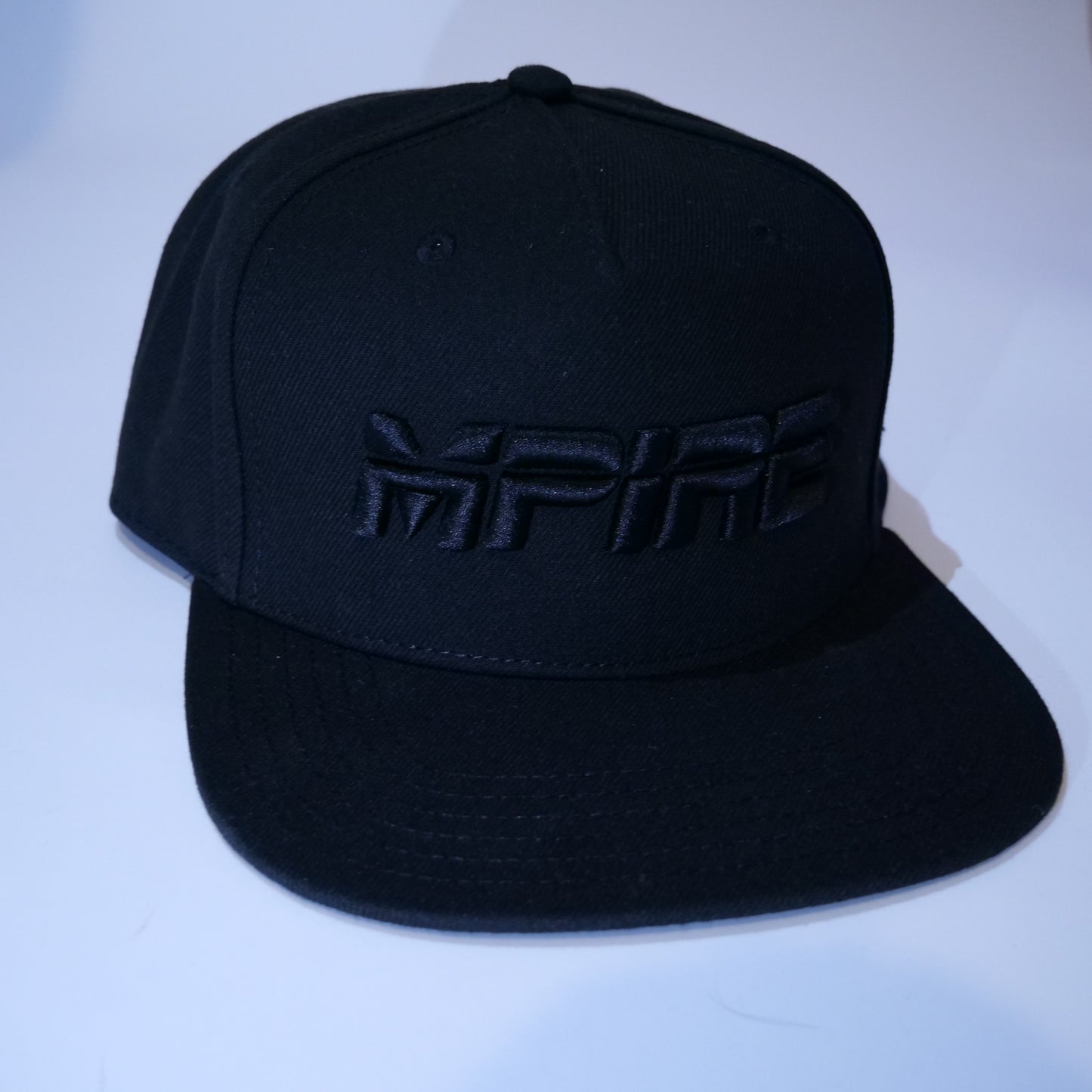 Triple Black Snapback Cap