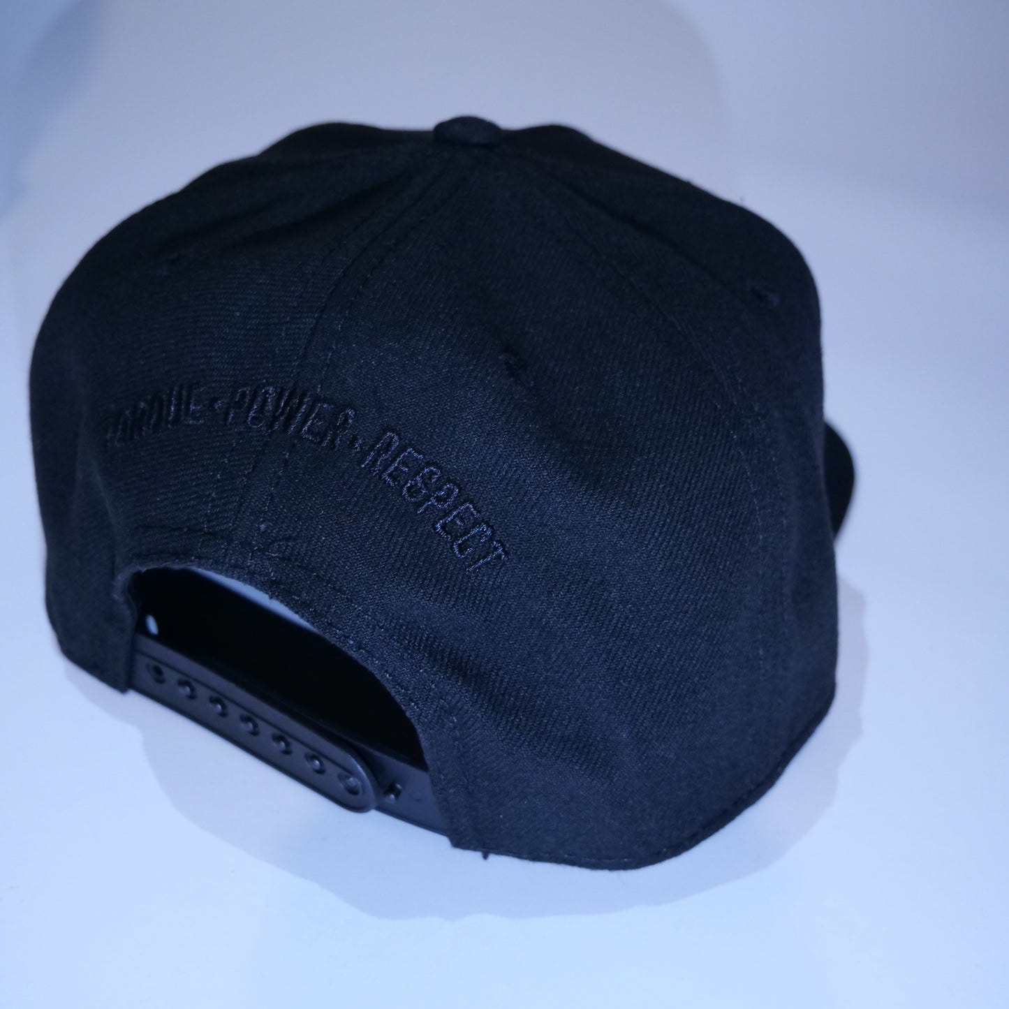 Triple Black Snapback Cap